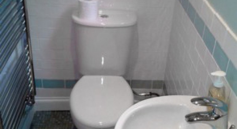 A new WC, basin and towel warming radiator finished the room off.